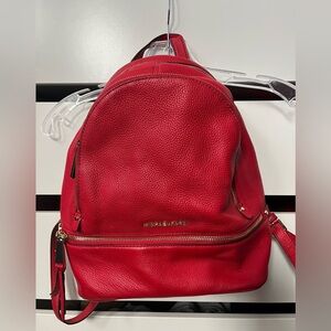 Red Michael Kors leather backpack